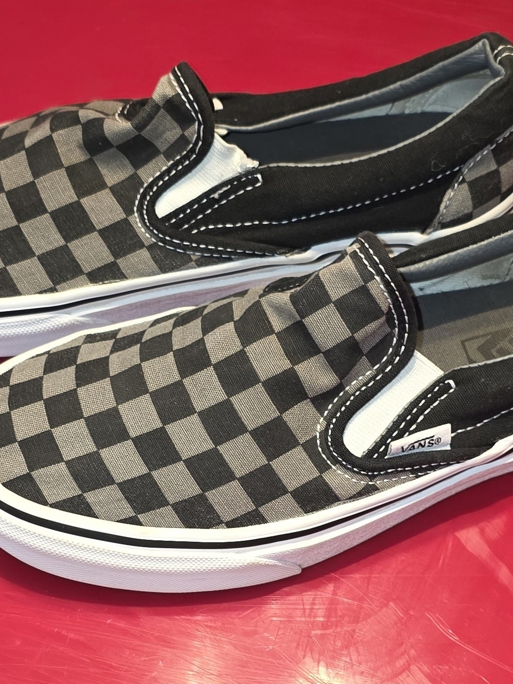 Vans Slip-On Checkerboard Sneakers in Black and Gray